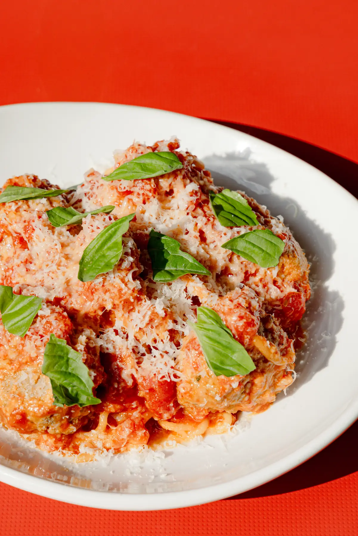 Rigatoni in red sauce topped with basil and grated cheese at Rosie's Italian in Cincinnati