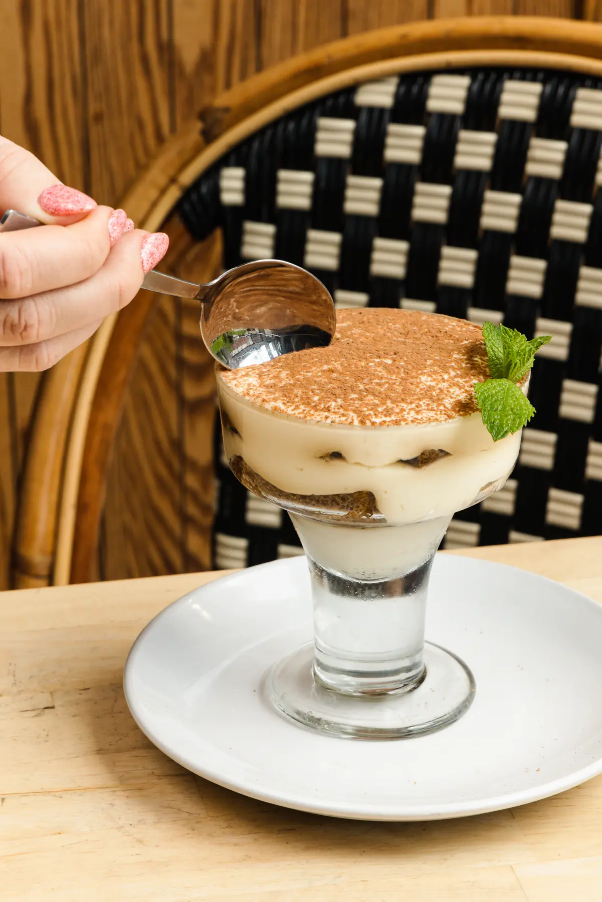 Tiramisu served in a footed glass at Rosie's Italian in Cincinnati