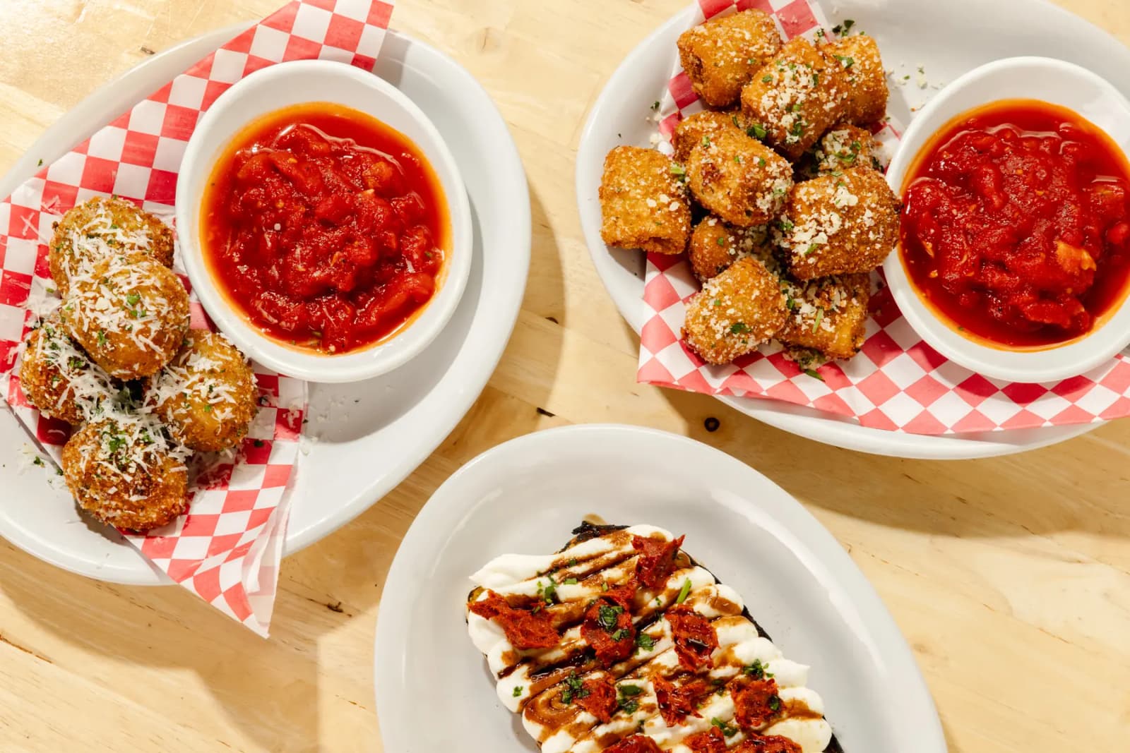 Arancini with marinara and a shared plate at Rosie's Italian in downtown Cincinnati